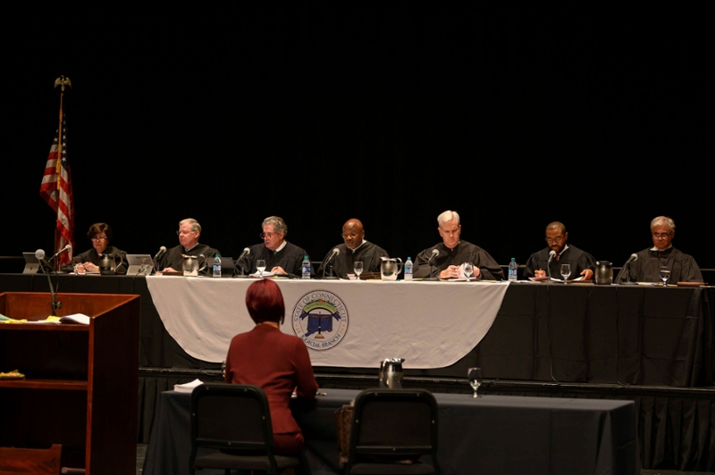 seven supreme court justices seated